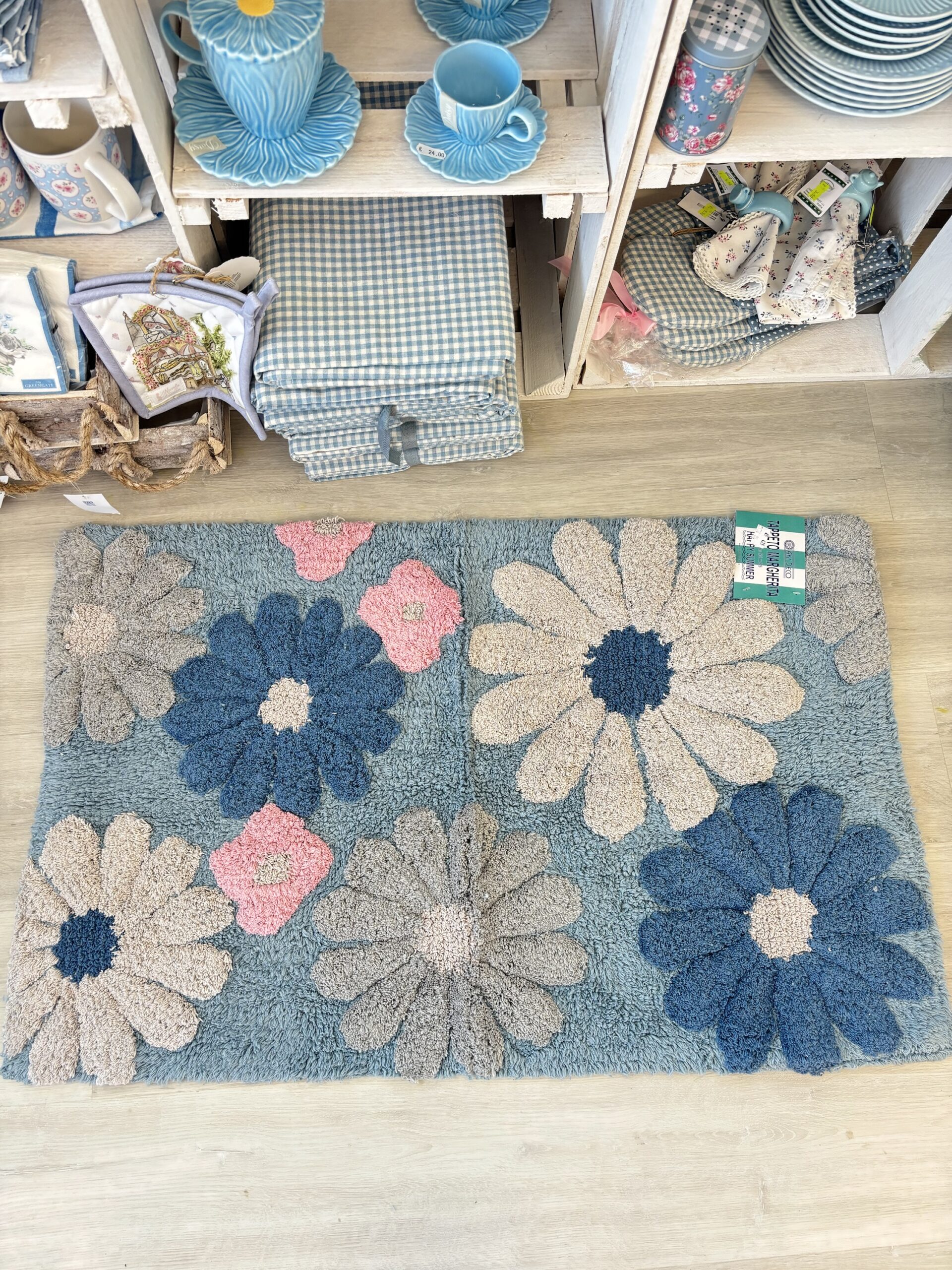 Tappeto fiori celeste