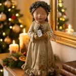 Bambina con albero nuvole di stoffa